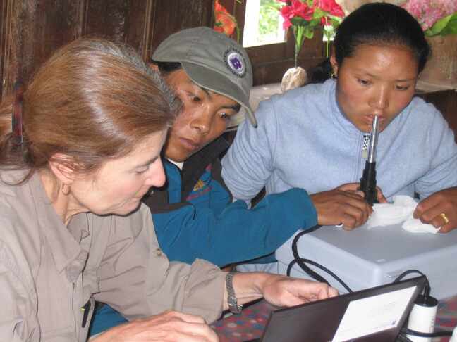 Professor Cynthia Beall in Khumbu Nepal using KK Technology HVCS Handheld CapiScope